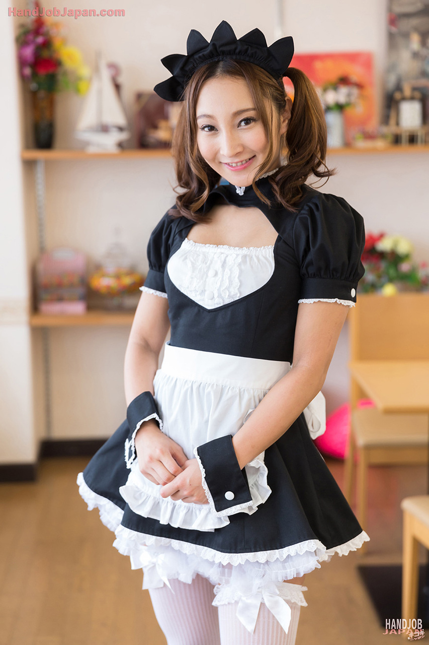 Cute Japanese maid gives her boss a handjob after he watches her masturbate  